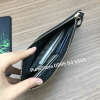 Vi cam tay Clutch Michael Kors
