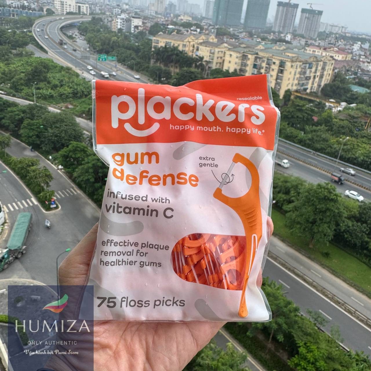 Tăm chỉ Plackers gum defense vitamin c gói 75 cây